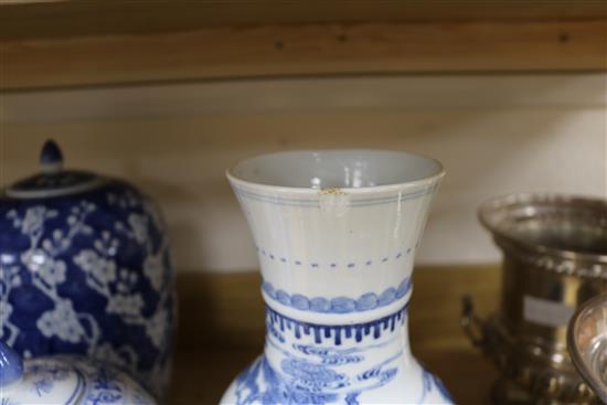 A 19th century Chinese blue and white prunus pattern vase and cover, 35cm., three other jars, two covers and
